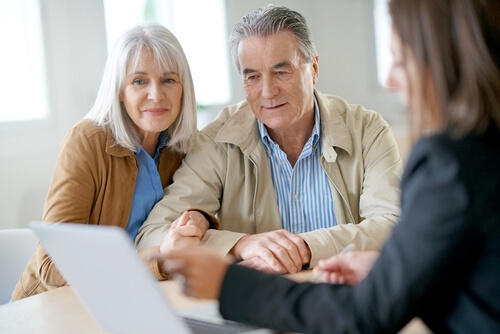retiring couple with attorney