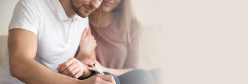 couple filling out paperwork for probate administration