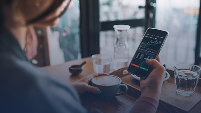 woman checking stock market